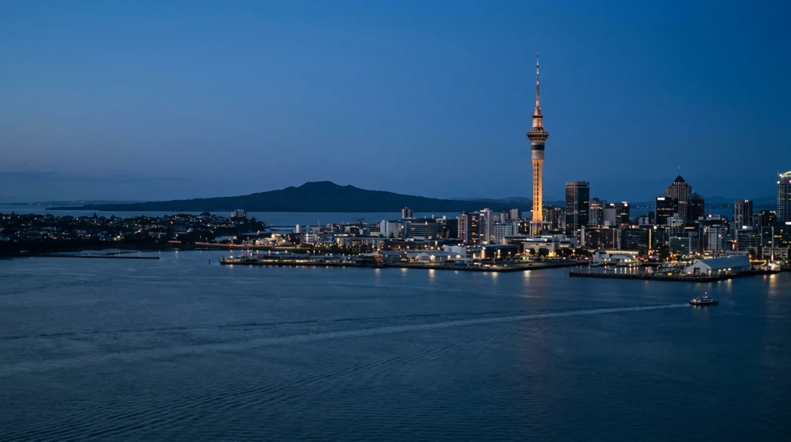 Auckland Sky Tower and Waitematā Harbour with Rangitoto Island in the distance