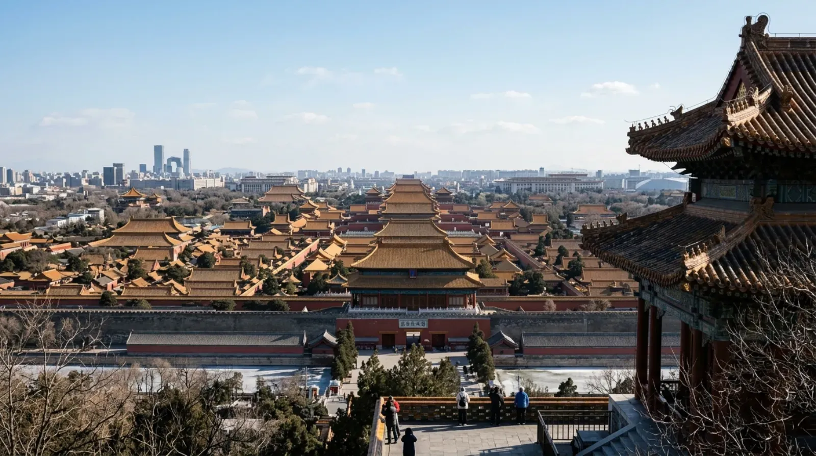 Forbidden City rooftops seen from Jingshan with Beijing in the distance
