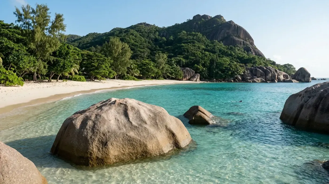 Granite boulders and turquoise water on a Seychelles beach